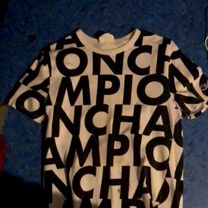 White champion shirt with the champion written all over